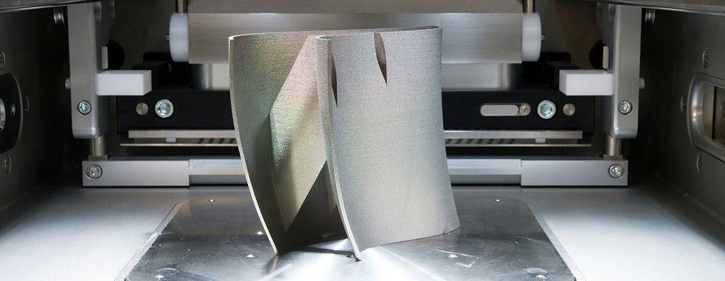Metal 3D printers (DMLS). Direct metal laser sintering (DMLS) is an additive manufacturing technique that uses a Ytterbium fibre laser fired into a bed of powdered metal.;