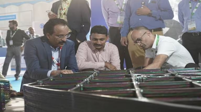 L ISRO chairman S Somanath and R Ankit Aerospace CEO Ankit Patel at Aero India Bengaluru with the 3D printed grid fin