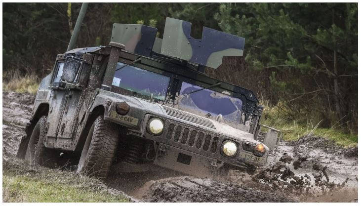 Soldiers maneuver a HMMWV at the 7th Army Training Commands Grafenwoehr Training Area Germany. Photo by Gertrud Zach US Army
