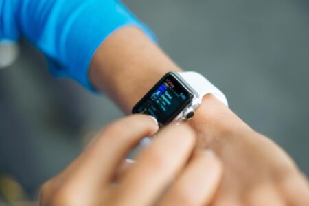 person wearing smart watch up close