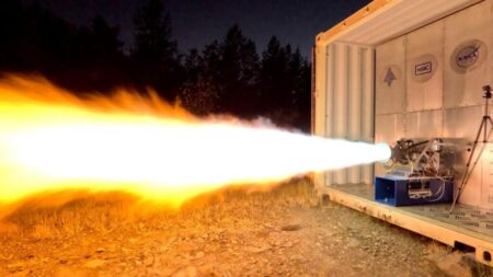 Flames stream from New Frontier Aerospace’s Mjölnir rocket engine during a hot-fire test. (NFA Photo)