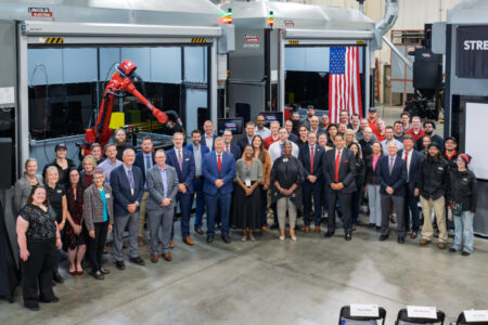 Ms. Larissa Smith, Director, Advanced Manufacturing, DRPM, Maritime Industrial Base Program, U.S. Navy, and Mr. Ken Jeanos, VP, Materials and Supply Chain, General Dynamics Electric Boat, are joined by Lincoln Electric leadership and its Additive Solutions team to commemorate the ribbon cutting that marks the investment of four SculptPrint™ 1500 additive manufacturing cells to support the production of critical submarine components.